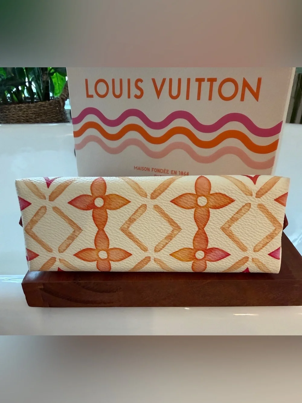 Louis Vuitton Cream Cosmetic Pouch with Pink & Orange Monogram.